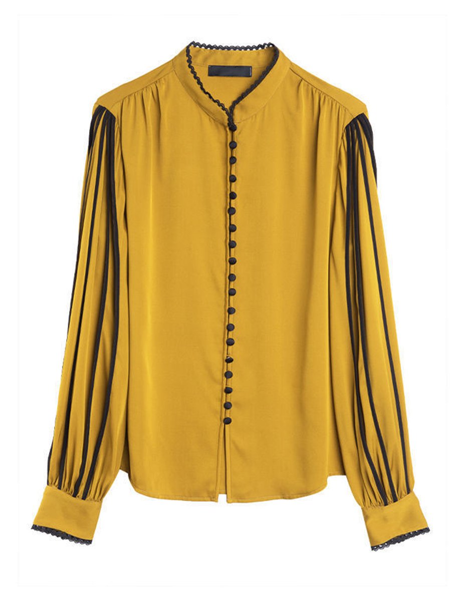 Elegant Blouse with Black Trim Accents