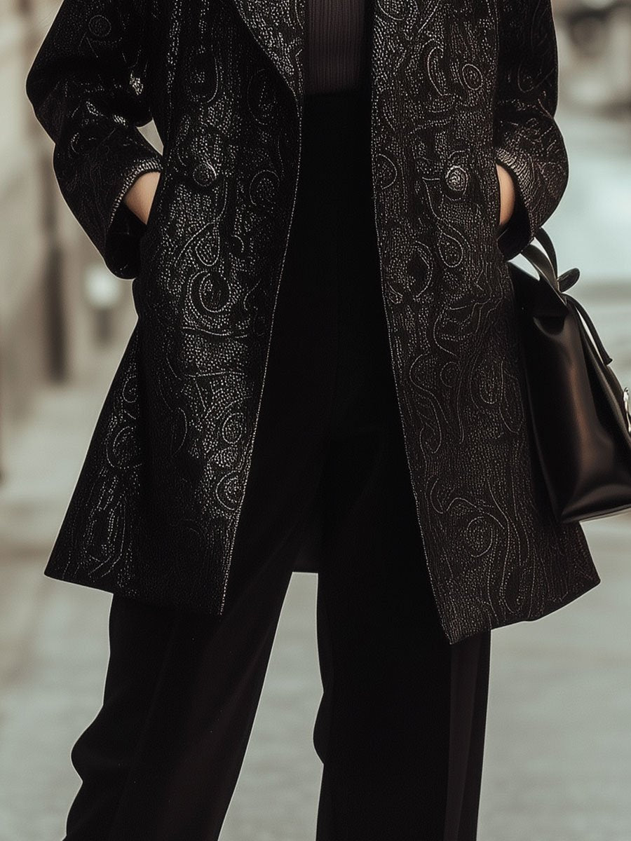 Elegant Black Textured Blazer with Subtle Paisley Motifs